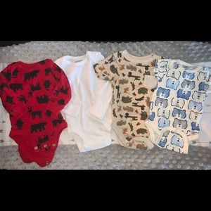4 pairs of onesies